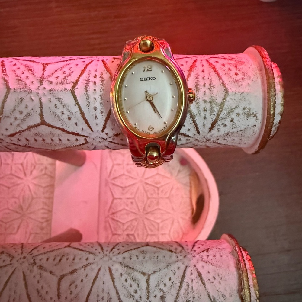 Seiko Women's Gold and White Watch